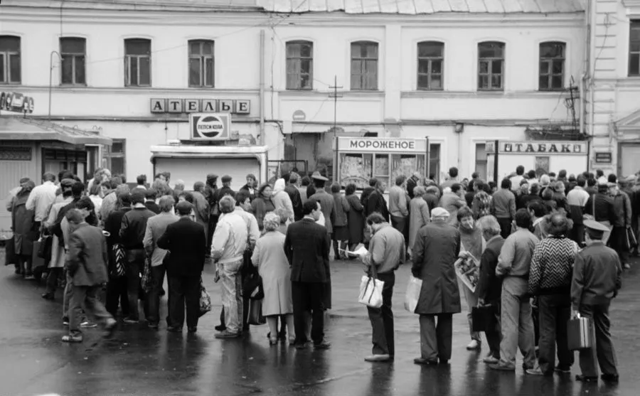 Queues in Moscow in the 1990s. The whole country is living through a brutal economic crisis.