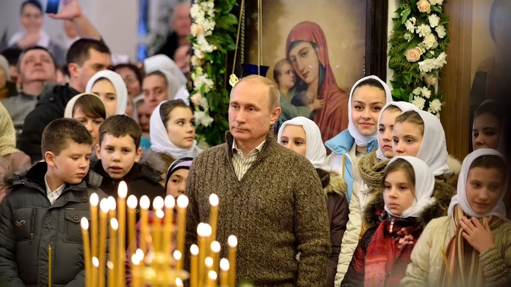 The president at a Christmas service in the church of the village of Otradnoye, Voronezh Region
